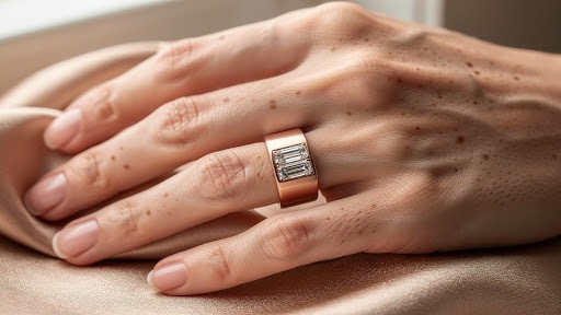 Hand showing a gold and diamond ring, photographed from above.
